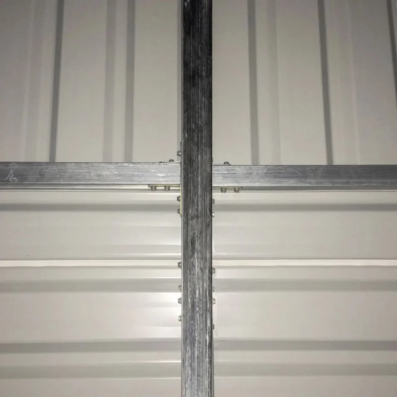 Metal carport with storage shed